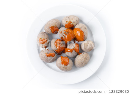 Papas arrugadas with mojo isolated on white background. Traditional Canary Islands food. 122829080