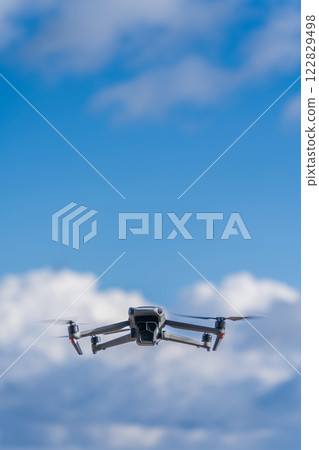 Drone flying blue sky Drone flying blue sky 122829498