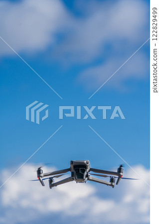 Drone flying blue sky Drone flying blue sky 122829499