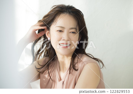 Portrait of a beautiful middle-aged woman 122829553