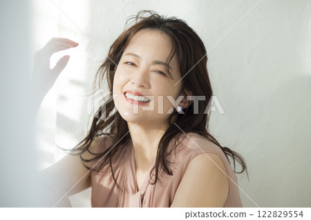 Portrait of a beautiful middle-aged woman 122829554