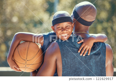 Portrait of happy boy with father and basketball outdoor after training, workout or practice. Black father carrying his boy after playing sport at a club or court during summer with a cute smile 122829917