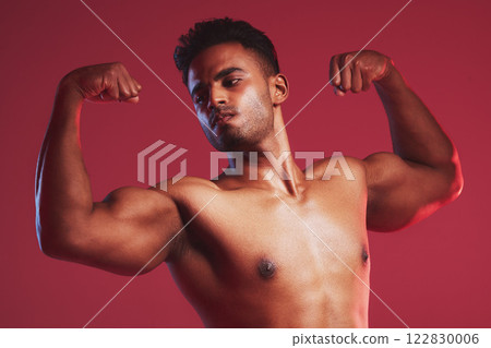 Fitness health, strong muscles and sports man with healthy body against red mockup studio background. Mock up of thinking, sport and Indian professional bodybuilder and weightlifter flexing muscle 122830006