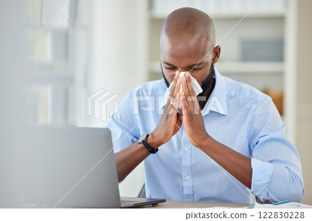 Covid, flu and healthcare virus for black businessman with laptop in office, company or creative startup. Medical burnout, allergy or sick worker, desk employee or entrepreneur blowing nose on tissue 122830228