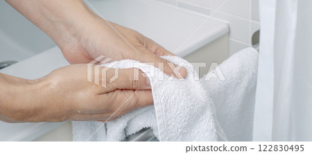 man drying his hands with a towel, banner man drying his hands with a towel, banner 122830495