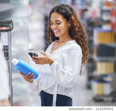 Woman shopping, phone and price check for inflation increase or discount coupon code. Young girl consumer calculating grocery tax of supermarket budget toiletries options on the shelf. 122830501