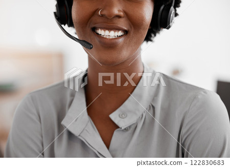 Call center, customer support and telemarketing with a woman consultant consulting on call with a headset. Crm, sales and contact us with a female employee working at a help desk in her office 122830683
