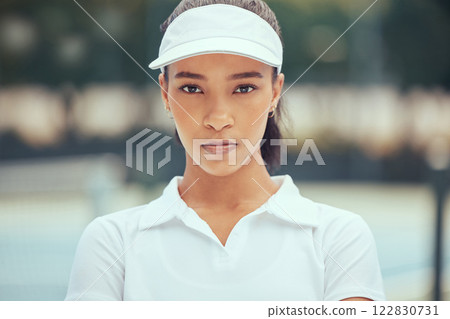 Tennis, portrait and sports woman with powerful mindset, vision or goal at outdoor court practice, training or match. Young black woman professional player face with fitness mission or game outlook Tennis, portrait and sports woman with powerful mindset, vision or goal at outdoor court practice, training or match. Young black woman professional player face with fitness mission or game outlook 122830731