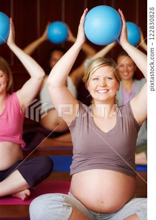 Pregnant women, pilates class and healthy exercise with multicultural mothers sitting together in a wellness studio. Health, childbirth and pregnancy session for happy women in maternity wear 122830828