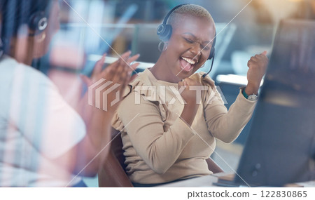 Call center, black woman and celebrating promotion or success in customer service at the workplace. Happy telemarketing agent or employee celebrate win or victory for best desktop support in office. Call center, black woman and celebrating promotion or success in customer service at the workplace. Happy telemarketing agent or employee celebrate win or victory for best desktop support in office. 122830865