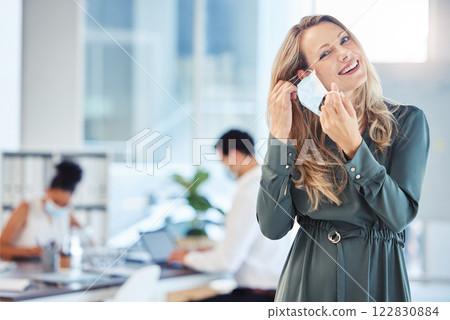 Business woman, employee and corporate worker removing covid mask in office at work, happy about end of pandemic and giving smile while working at startup company. Portrait of manager free from virus 122830884