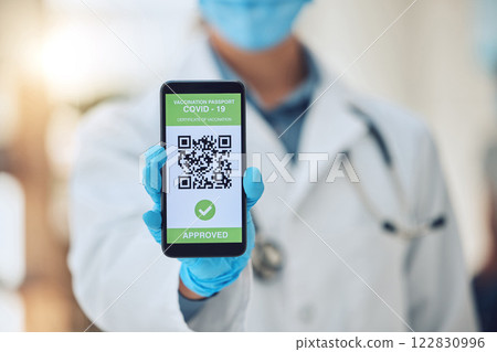 Doctor covid travel, vaccine passport on smartphone and vaccination certificate. International immigration, digital health innovation app, qr code technology and airport security regulation check 122830996