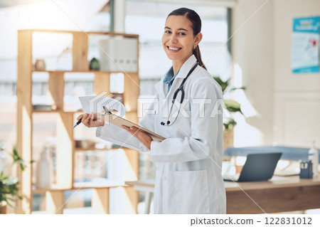 Doctor, healthcare and consulting with a medical or health professional reading paperwork in the hospital. Trust, insurance and medicine with a woman in a clinic for health, wellness and medicare Doctor, healthcare and consulting with a medical or health professional reading paperwork in the hospital. Trust, insurance and medicine with a woman in a clinic for health, wellness and medicare 122831012