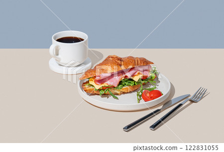 Croissant sandwich with ham, cheese, tomato  and arugula on a plate on a light background 122831055