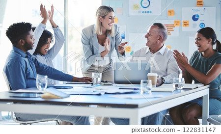Clapping, success and diversity business meeting with infographic paper, teamwork and collaboration. Smile, happy and exctied men, women and digital marketing group with strategy winner and crm deal 122831147