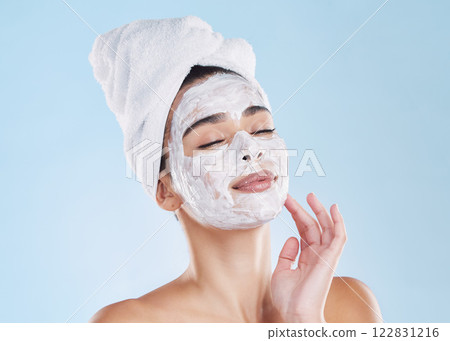 Skincare woman, beauty facial mask and cosmetics after fresh shower, bathroom grooming routine and bodycare on blue background. Feminine face, clean spa pores and healthy pamper treatment complexion Skincare woman, beauty facial mask and cosmetics after fresh shower, bathroom grooming routine and bodycare on blue background. Feminine face, clean spa pores and healthy pamper treatment complexion 122831216