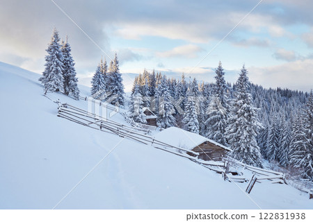 Fantastic winter landscape, the steps that lead to the cabin. Magic event in frosty day. In anticipation of the holiday. Dramatic scenes. Carpathian, Ukraine, Europe Fantastic winter landscape, the steps that lead to the cabin. Magic event in frosty day. In anticipation of the holiday. Dramatic scenes. Carpathian, Ukraine, Europe 122831938