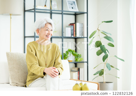 Senior woman relaxing in the living room 122832126