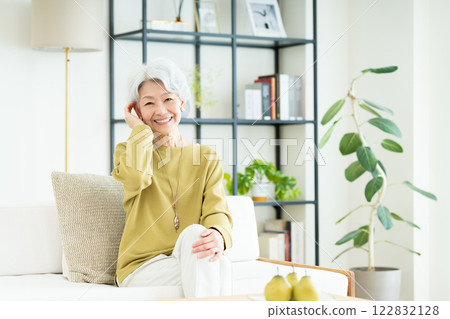 Senior woman relaxing in the living room 122832128
