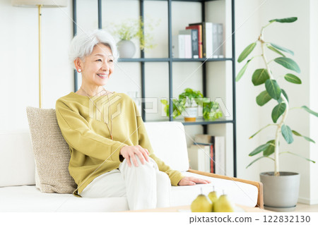 Senior woman relaxing in the living room 122832130