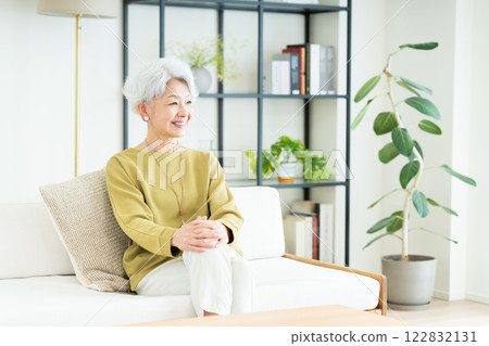 Senior woman relaxing in the living room 122832131