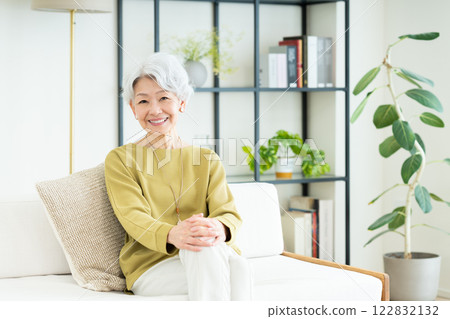 Senior woman relaxing in the living room 122832132