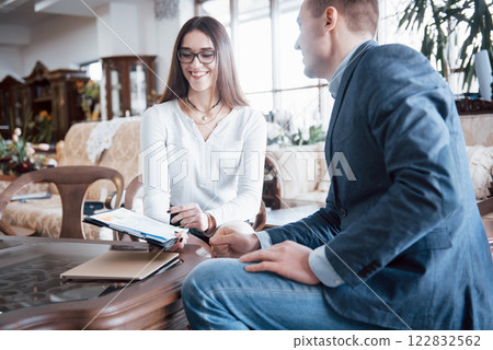 Image of two successful business partners working at meeting in office 122832562
