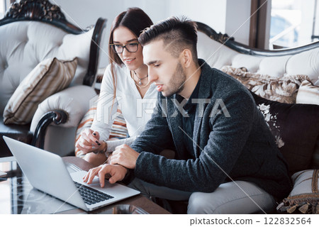 Image of two successful business partners working at meeting in office 122832564