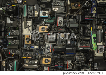 Many old polaroid vintage photography cameras on display Many old polaroid vintage photography cameras on display 122832911