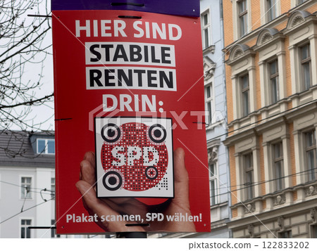 Berlin, Germany - January 14, 2025: Election campaign poster of the German political party SPD Social Democratic Party for the 2025 federal election. The slogan is There are stable pensions here Berlin, Germany - January 14, 2025: Election campaign poster of the German political party SPD Social Democratic Party for the 2025 federal election. The slogan is There are stable pensions here 122833202