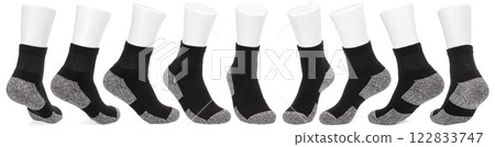 Black sports sock with reinforced heel and toe on a mannequin foot Black sports sock with reinforced heel and toe on a mannequin foot 122833747