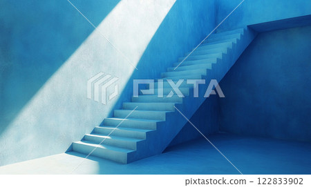 Blue staircase with a light shining on it. The staircase is empty and the room is blue Blue staircase with a light shining on it. The staircase is empty and the room is blue 122833902