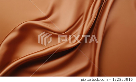 Piece of fabric with a brown color and a shiny texture. The fabric is long and has a smooth surface 122833916