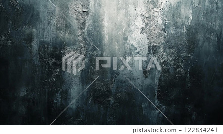 Wall with a lot of paint splatters and a few holes. The wall is dark and the paint is chipped 122834241