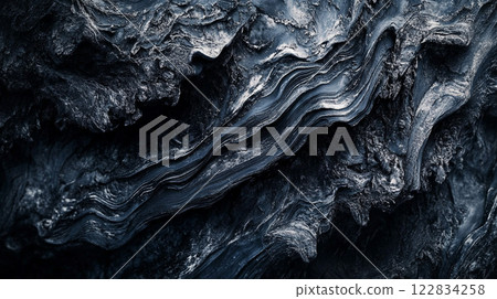 Blue and white image of a wave with a lot of detail. The image has a mood of calmness and serenity Blue and white image of a wave with a lot of detail. The image has a mood of calmness and serenity 122834258