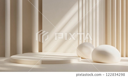 White room with a white wall and a white ceiling. There are two white balls on the floor 122834298