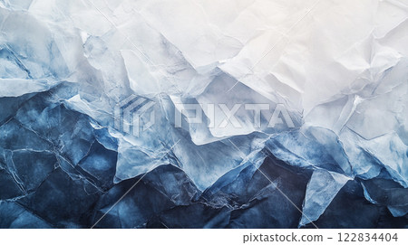 Blue and white paper with a rough texture. The paper is crumpled and torn, giving it a sense of movement and energy. The blue and white colors create a calming and serene atmosphere Blue and white paper with a rough texture. The paper is crumpled and torn, giving it a sense of movement and energy. The blue and white colors create a calming and serene atmosphere 122834404