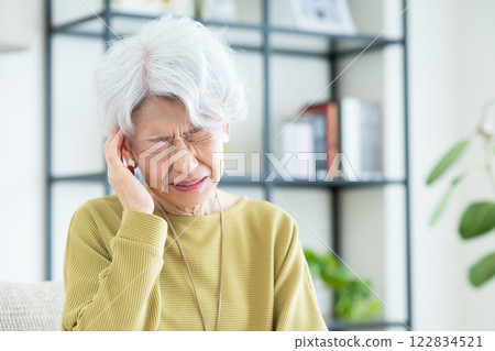 Senior woman with headache 122834521