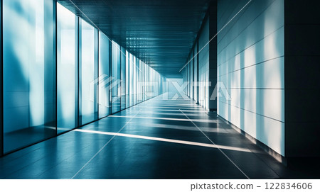 Long hallway with a lot of windows. The windows are clear and the hallway is very bright Long hallway with a lot of windows. The windows are clear and the hallway is very bright 122834606