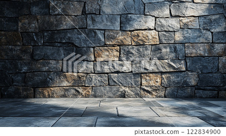 Large stone wall with a shadow cast on it. The shadow is dark and elongated, stretching across the entire wall. The wall is made of rough, uneven stones Large stone wall with a shadow cast on it. The shadow is dark and elongated, stretching across the entire wall. The wall is made of rough, uneven stones 122834900