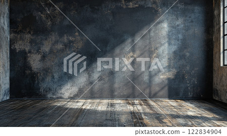 Room with a large wall and a window. The wall is covered in graffiti and the room is empty 122834904