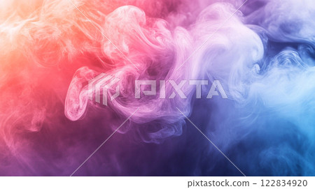 Colorful smoke cloud with a purple and blue swirl. The smoke is thick and billowing, creating a sense of movement and energy. The colors of the smoke contrast with the blue and purple background 122834920