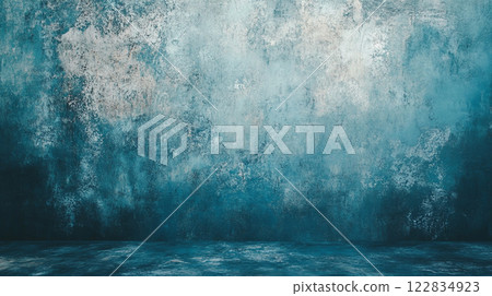 Blue wall with a splash of white paint. The wall is covered in a textured, grainy paint that gives it a rough, almost rugged appearance. The blue color of the wall is calming and serene Blue wall with a splash of white paint. The wall is covered in a textured, grainy paint that gives it a rough, almost rugged appearance. The blue color of the wall is calming and serene 122834923