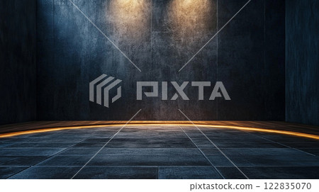 Large, empty room with a yellow light shining on the floor. The room is dark and the light is on, creating a warm and inviting atmosphere 122835070