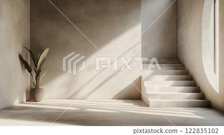 White room with a plant in a pot and a staircase. The room is empty and the plant is the only decoration 122835102