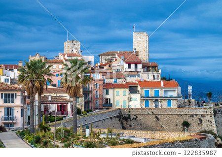 Antibes castle and central square, palm and cactus garden by the sea 122835987