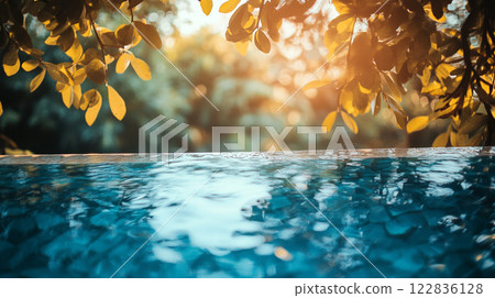 Body of water with leaves floating on top. The water is calm and peaceful. The leaves are green and add a touch of nature to the scene Body of water with leaves floating on top. The water is calm and peaceful. The leaves are green and add a touch of nature to the scene 122836128