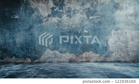 Large wall with a blue sky and clouds. The wall is made of concrete and has a rough texture. The sky is filled with clouds, and the sun is shining through them 122836168