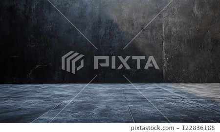 Large empty room with a grey wall and a grey floor. The room is empty and has no furniture 122836188