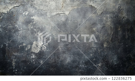 Wall with a lot of cracks and holes. The wall is gray and black. The wall is old and worn 122836275